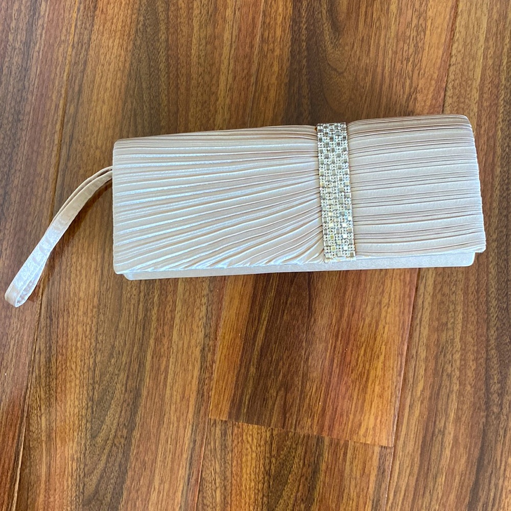 Satin clutch bag.